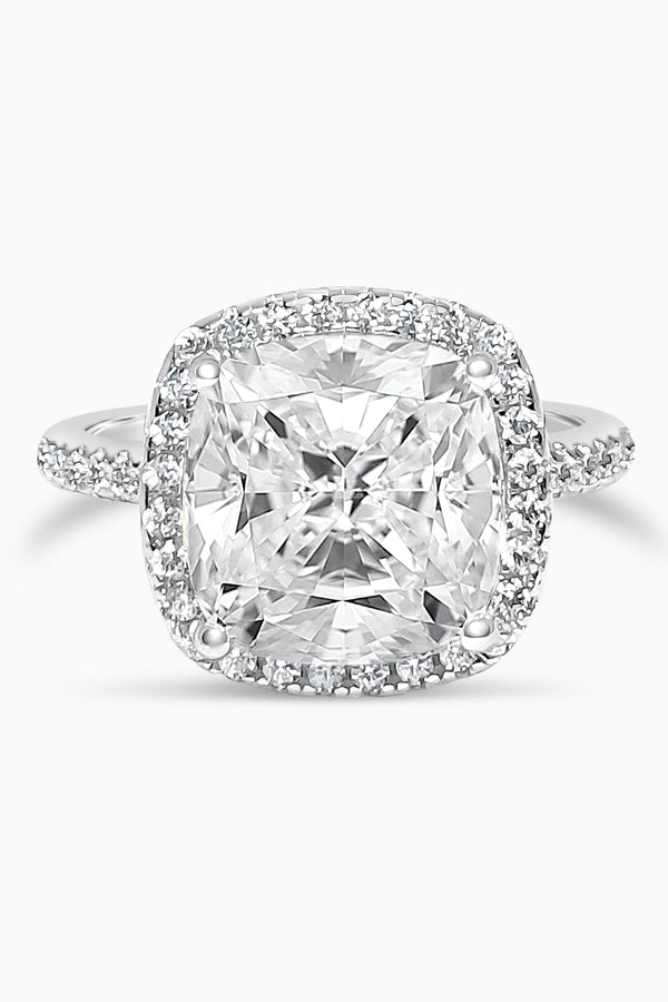 White Gold Large Cushion Cut with Surrounding Halo and Pavé stones all along the prongs, crown, and band