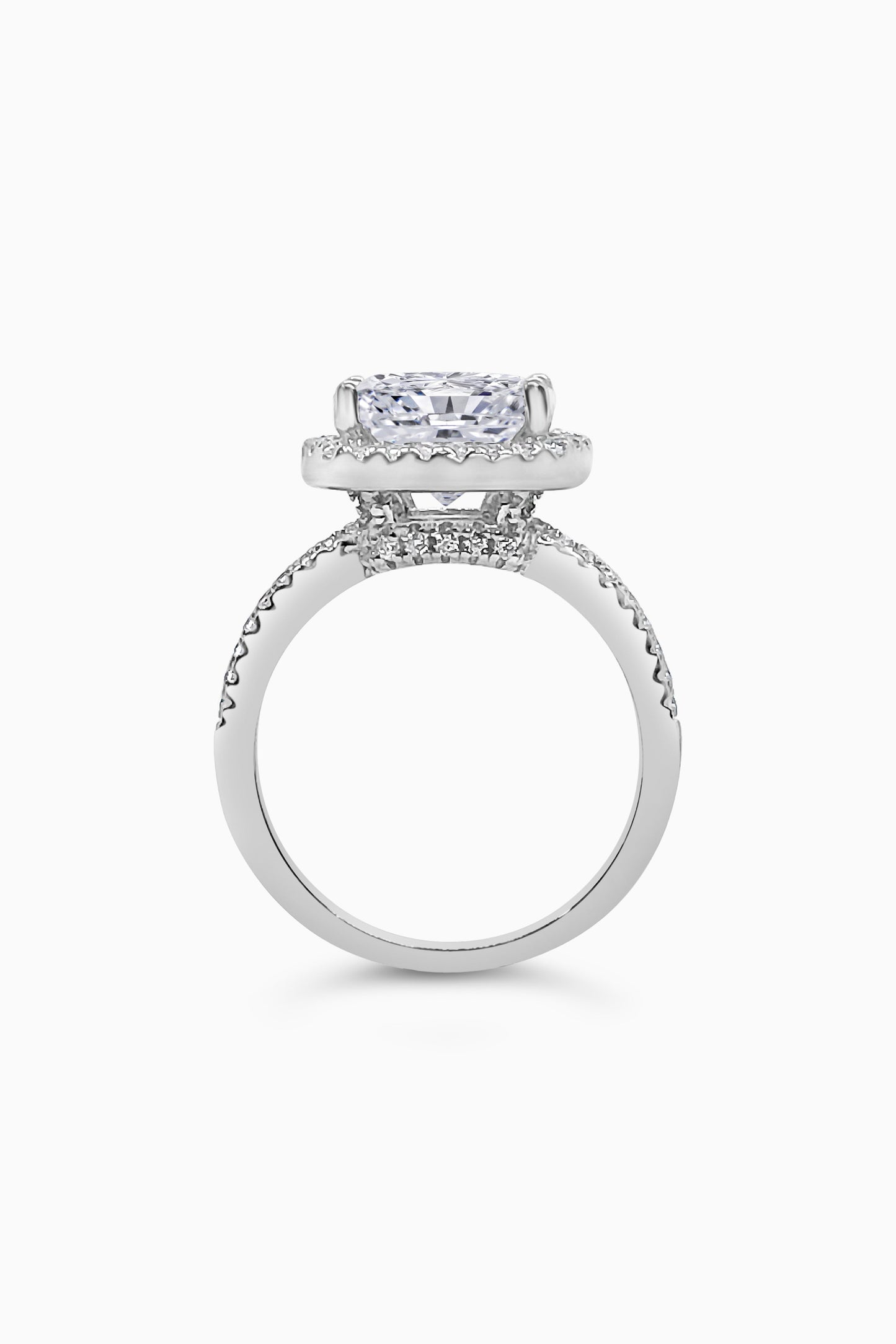 White Gold Large Cushion Cut with Surrounding Halo and Pavé stones all along the prongs, crown, and band - Side View