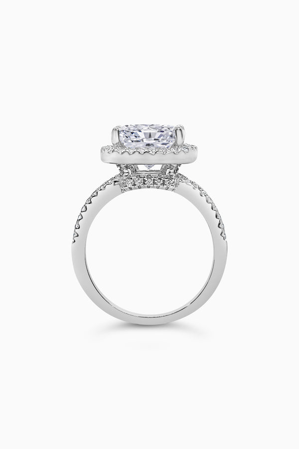 White Gold Large Cushion Cut with Surrounding Halo and Pavé stones all along the prongs, crown, and band - Side View