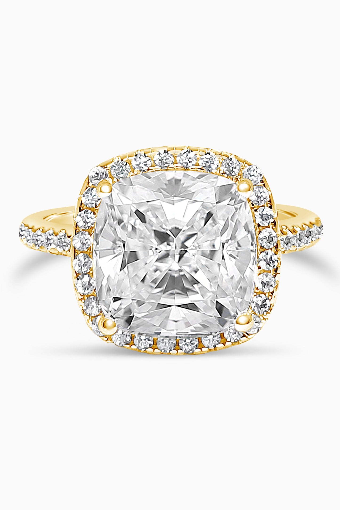 Yellow Gold Large Cushion Cut with Surrounding Halo and Pavé stones all along the prongs, crown, and band