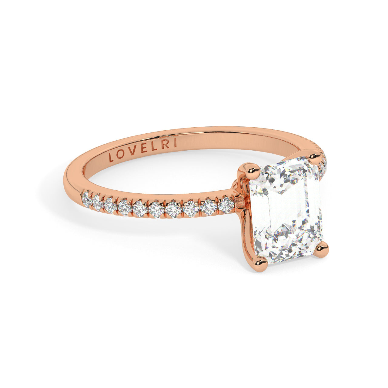 Rose Gold Emerald Cut Engagement Ring set on a Pavé Band - Rotated View