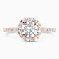 Rose Gold Round Cut Stone set on a Low Profile Setting with a Halo and Pavé Band