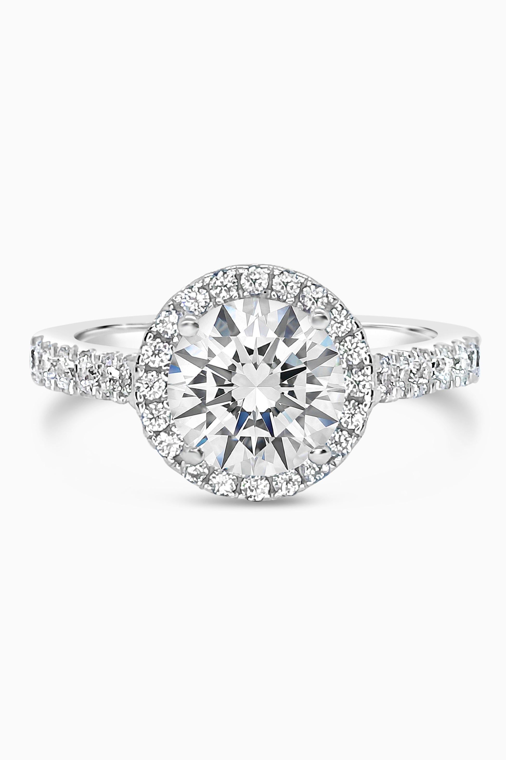 White Gold Round Cut Engagement Ring with Halo and Pavé Band Cathedral Setting