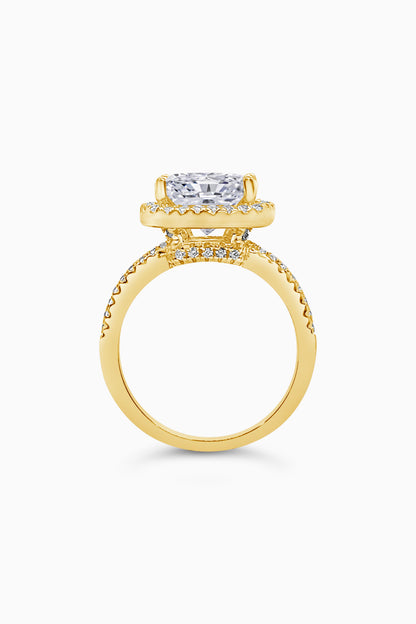 Yellow Gold Large Cushion Cut with Surrounding Halo and Pavé stones all along the prongs, crown, and band - Side View