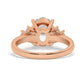 Rose Gold Oval Cut Engagement Ring with Accompanying Round Stones - Back View