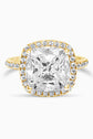 Yellow Gold Large Cushion Cut with Surrounding Halo and Pavé stones all along the prongs, crown, and band