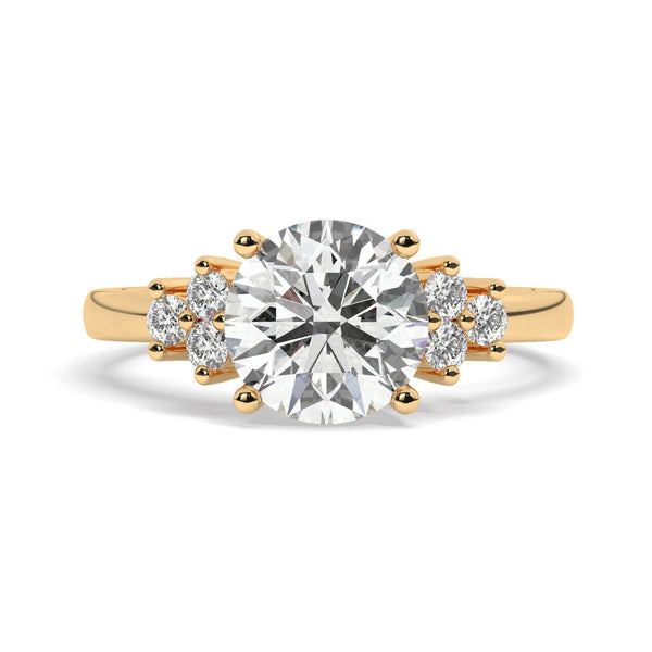Yellow Gold Round Cut Engagement Ring Accompanied by Round Side Stones
