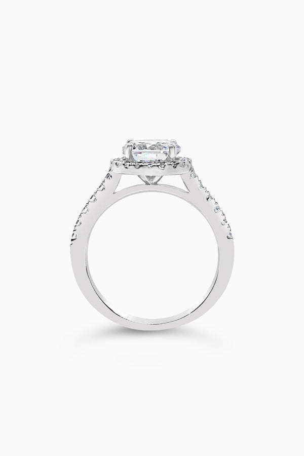 White Gold Round Cut Engagement Ring with Halo and Pavé Band Cathedral Setting - Side View