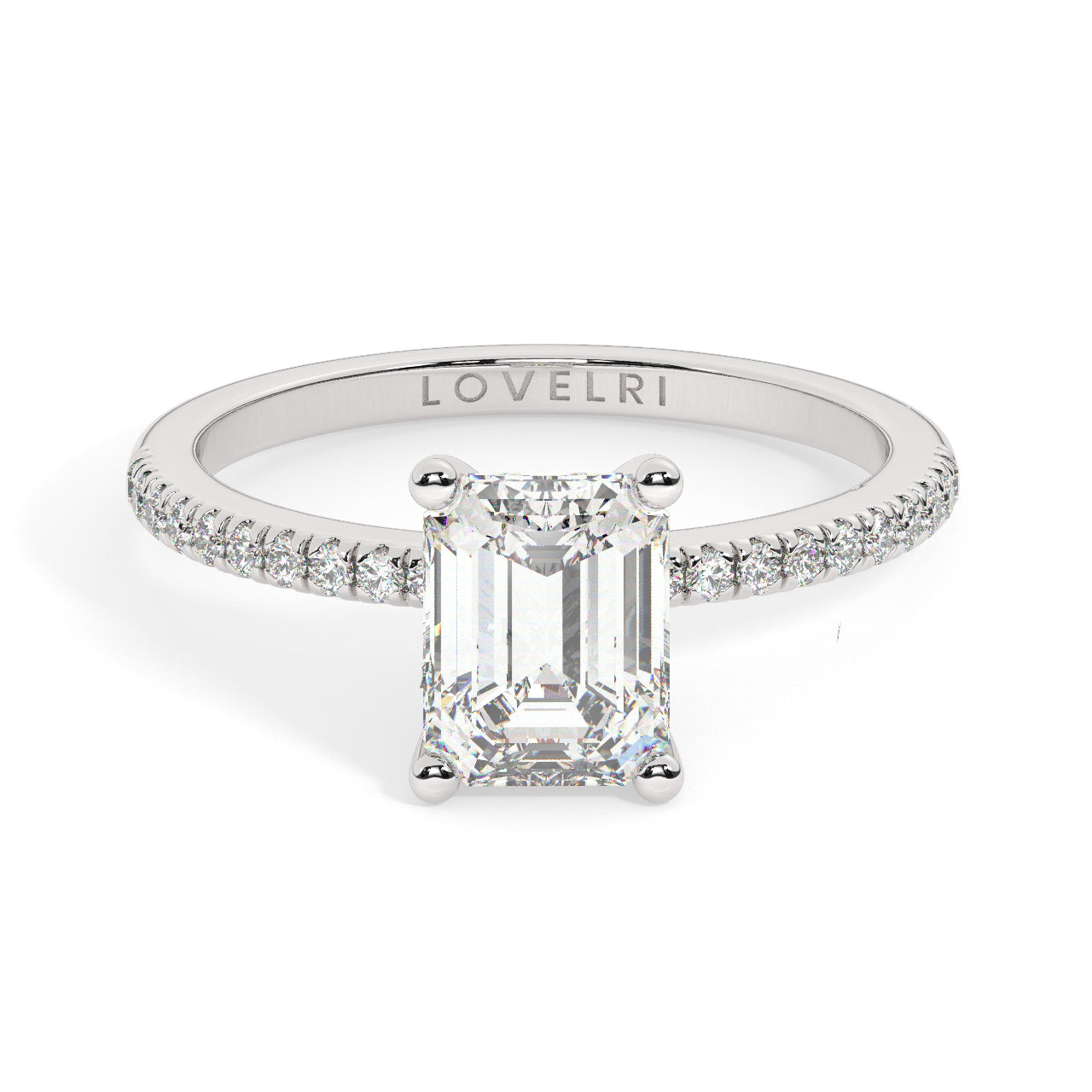 White Gold Emerald Cut Engagement Ring set on a Pav√© Band