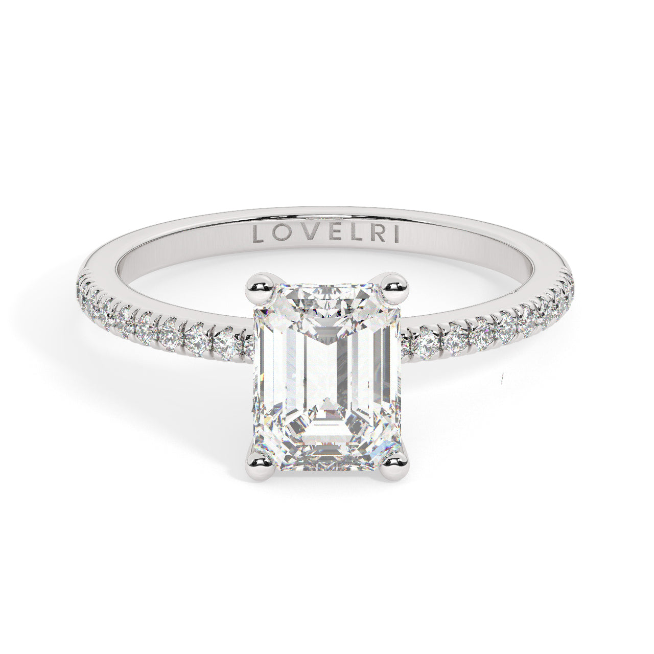 White Gold Emerald Cut Engagement Ring set on a Pavé Band