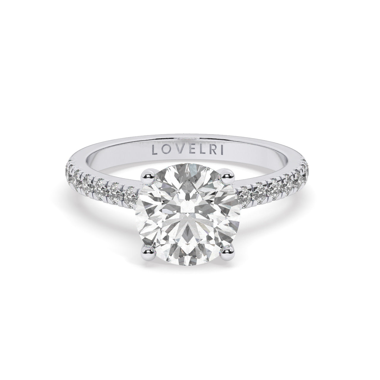 White Gold Round Cut Engagement Ring with a Pav√© Band and a Hidden Stone