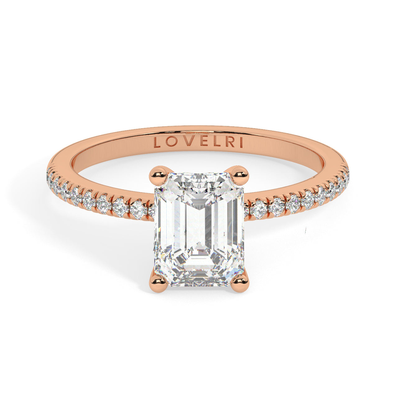 Rose Gold Emerald Cut Engagement Ring set on a Pavé Band