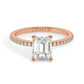 Rose Gold Emerald Cut Engagement Ring set on a Pavé Band