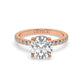 Rose Gold Round Cut Engagement Ring on a Pavé Band with a Hidden Halo