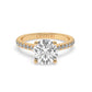 Yellow Gold Round Cut Engagement Ring with a Pavé Band and a Hidden Stone
