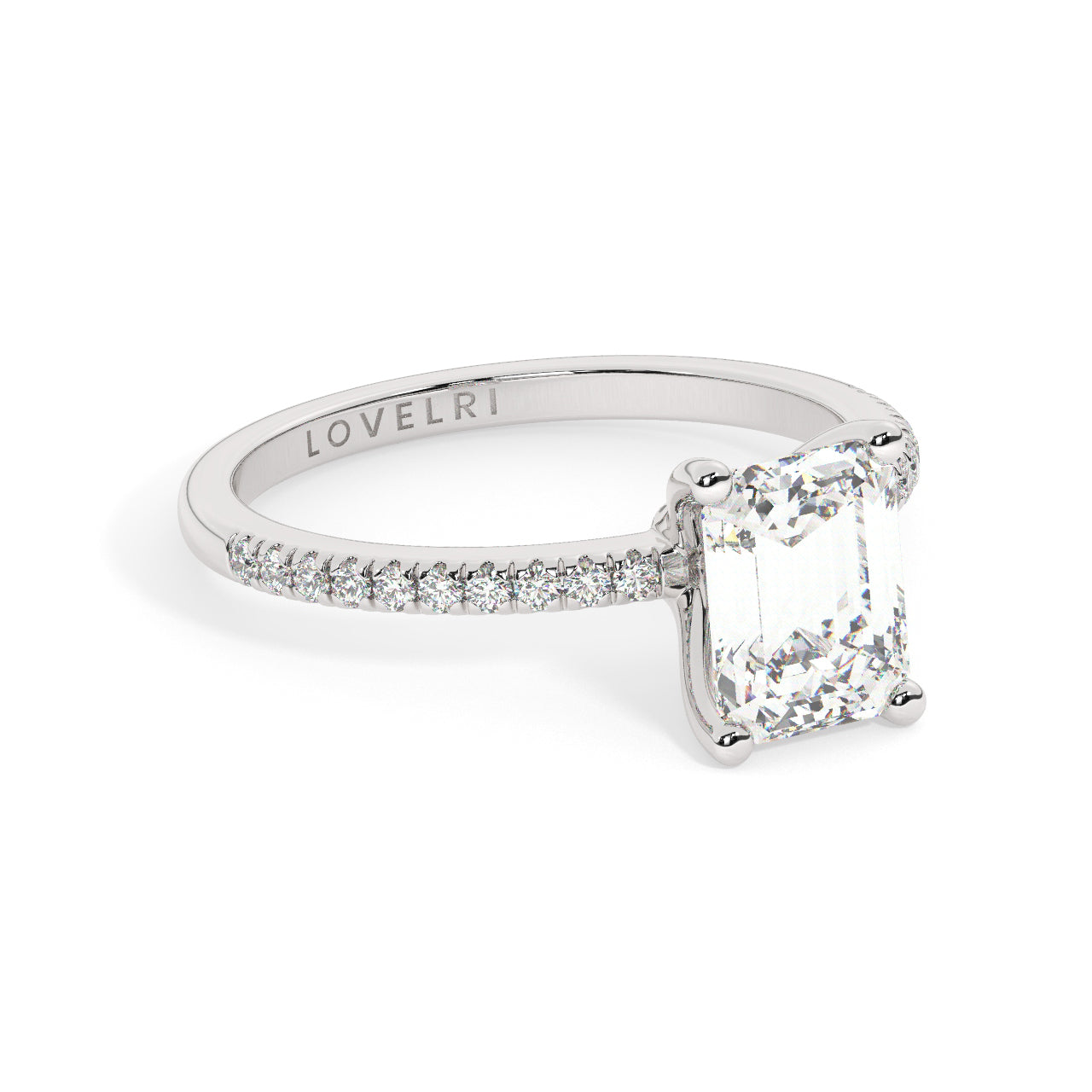 White Gold Emerald Cut Engagement Ring set on a Pav√© Band - Rotated View