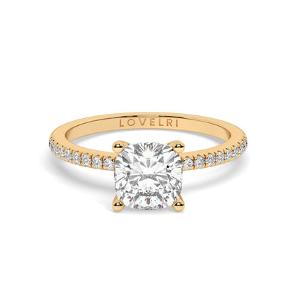 Round Cut Diamond Ring set on a Pavé Band in Yellow Gold
