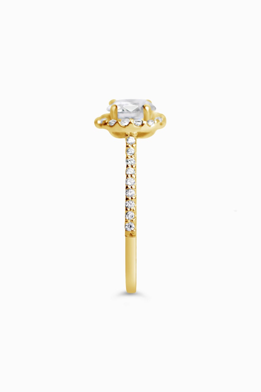 Yellow Gold Round Cut Stone set on a Low Profile Setting with a Halo and Pavé Band - Other Side View