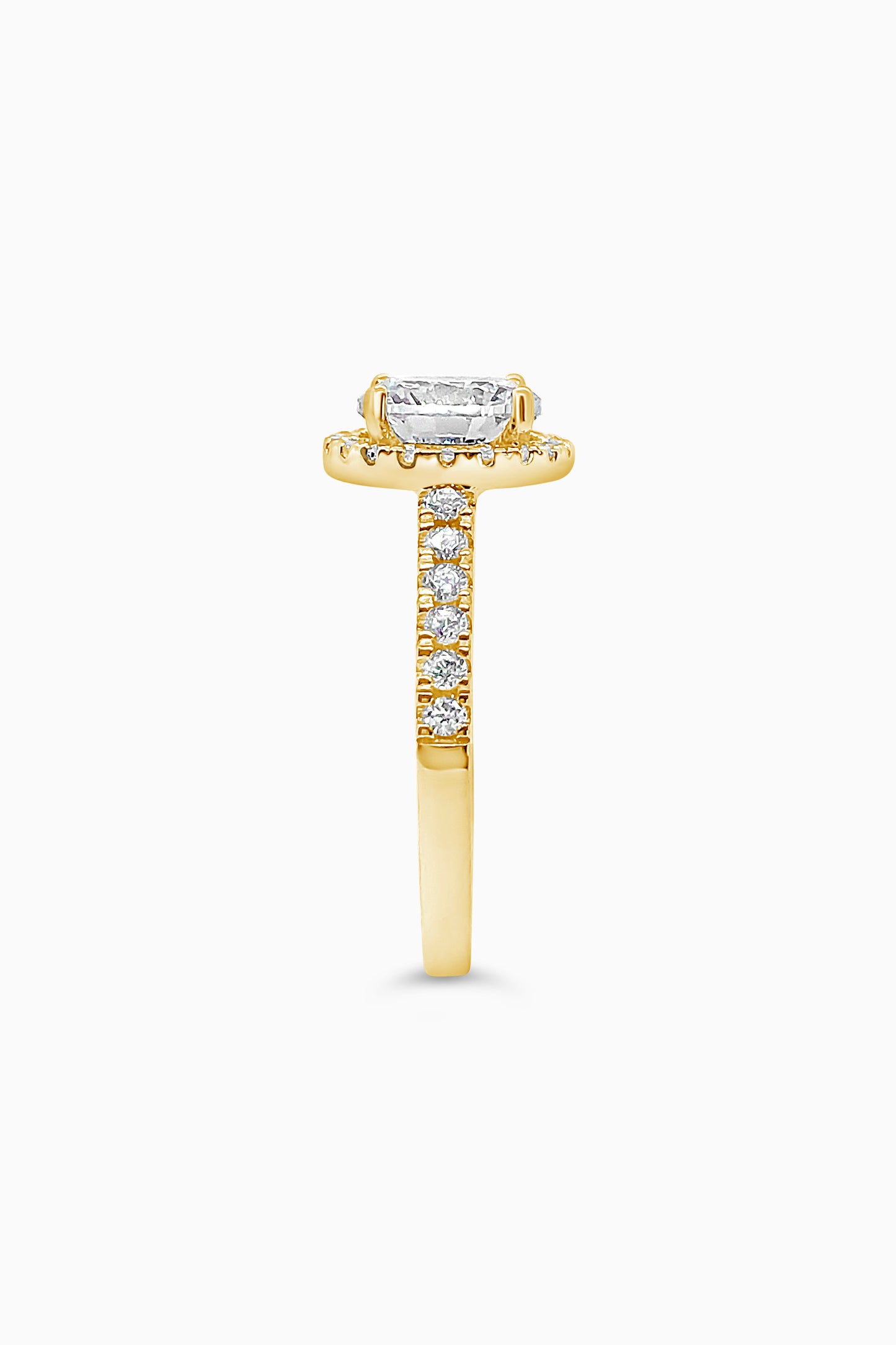Yellow Gold round cut stone surrounded by a Square Halo and Pavé band - Other Side View