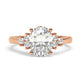 Rose Gold Oval Cut Engagement Ring with Accompanying Round Stones