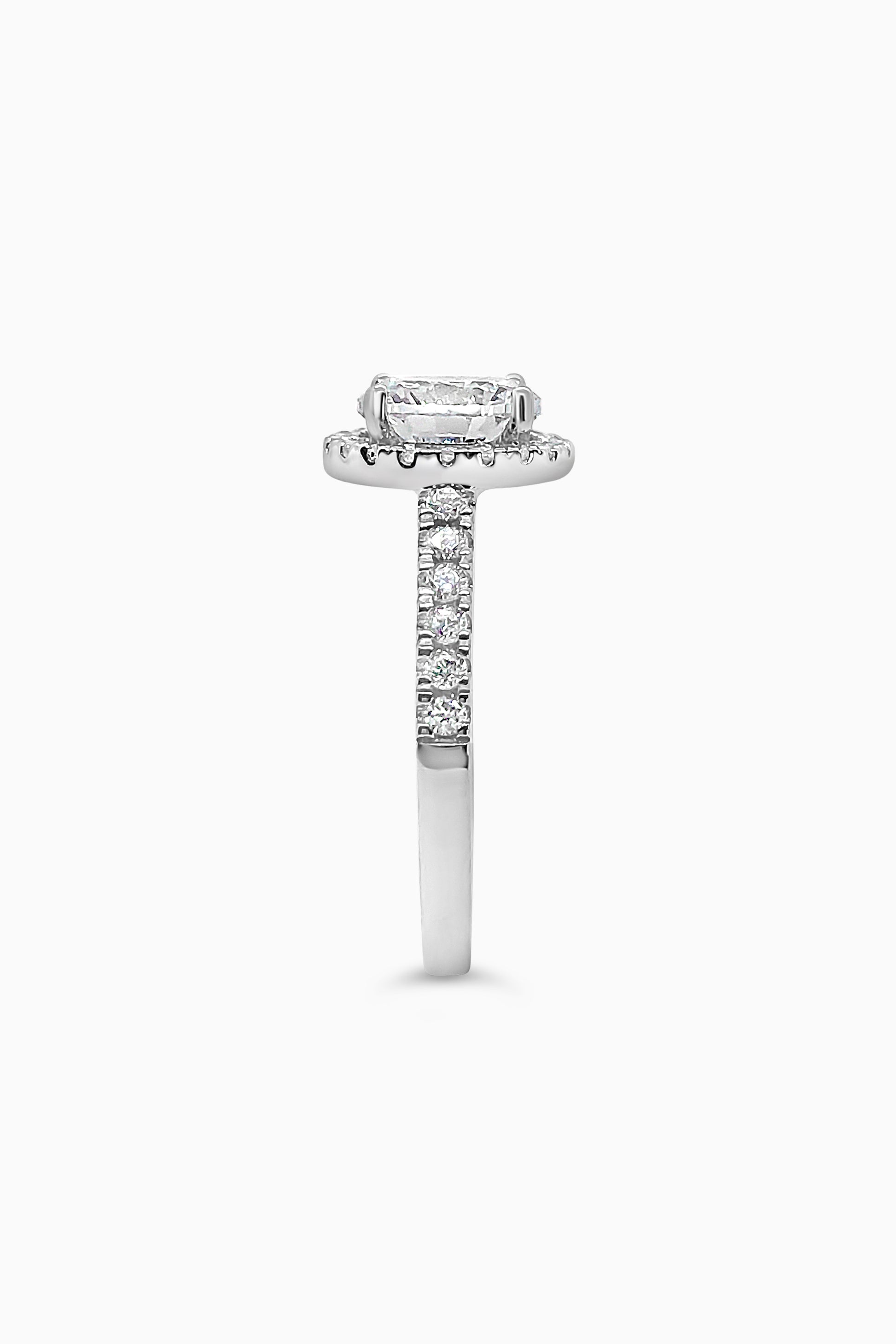 White Gold round cut stone surrounded by a Square Halo and Pavé band - Other Side View