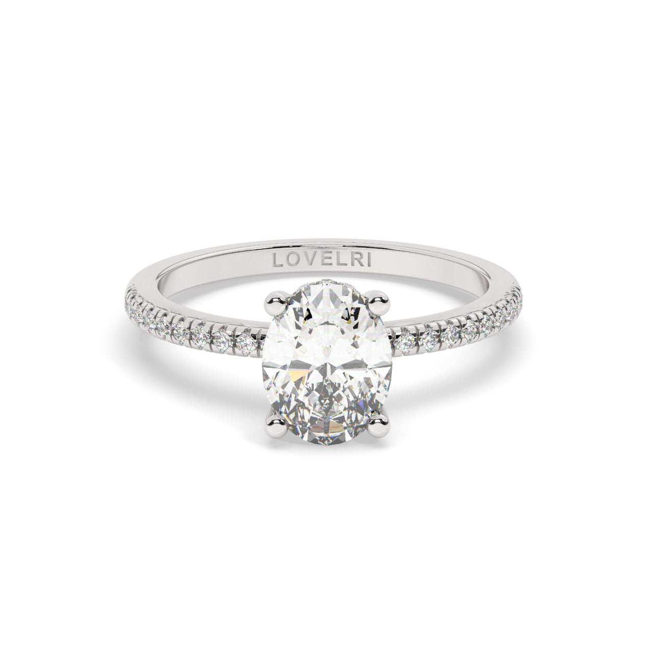 White gold oval diamond set with a hidden halo on a pave setting - front view
