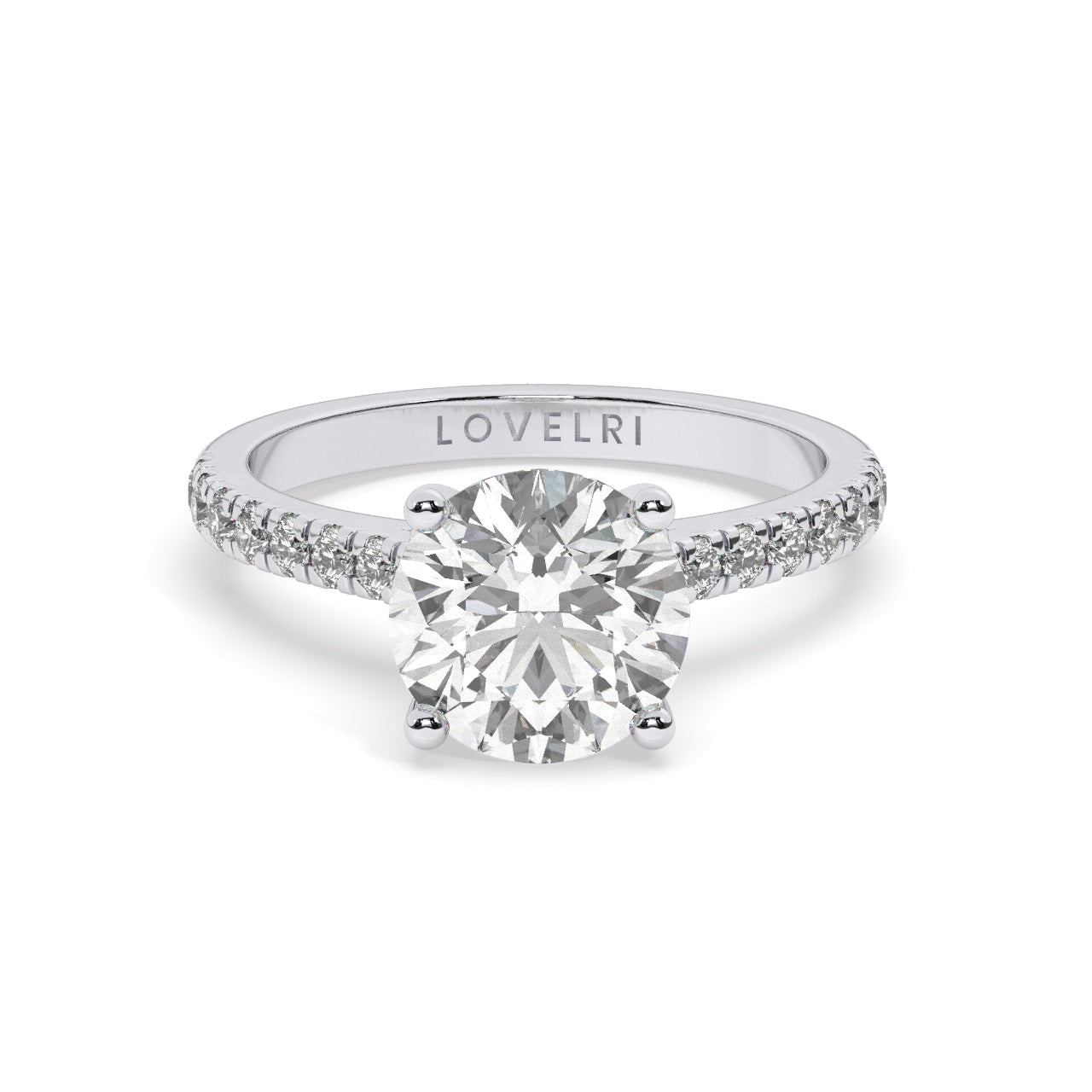 White Gold Round Cut Engagement Ring with a Pavé Band and a Hidden Stone