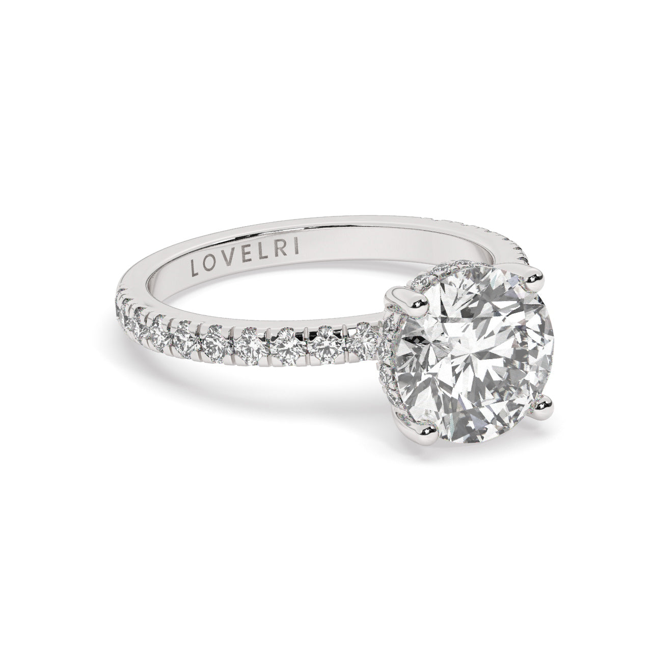 Platinum Round Cut Engagement Ring on a Pavé Band with a Hidden Halo - Rotated View