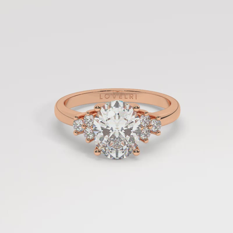 Rose Gold Oval Cut Engagement Ring with Accompanying Round Stones - 360 View