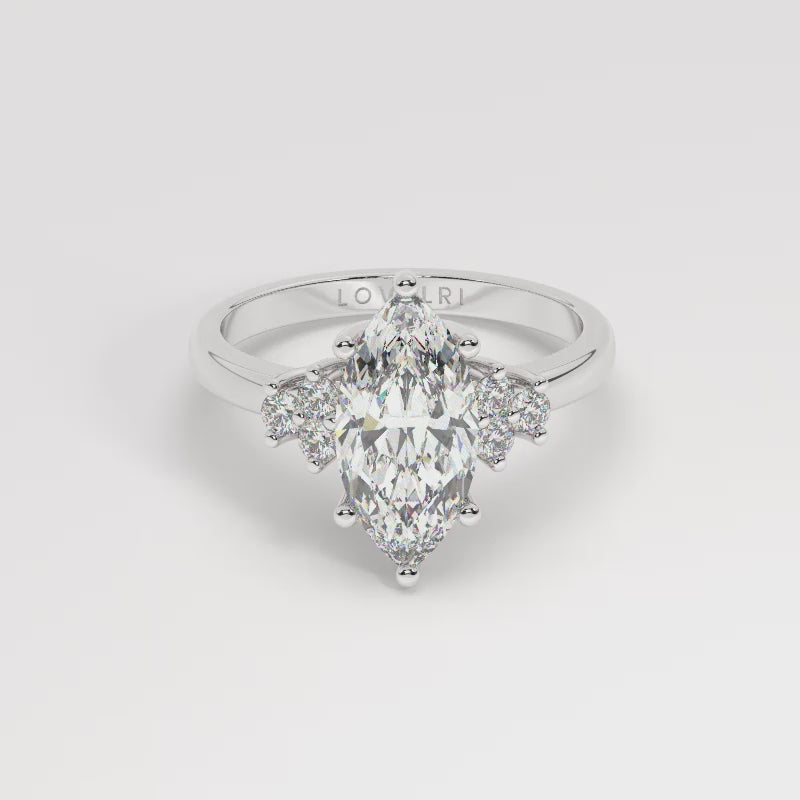 White Gold Marquis Cut Engagement Ring Accompanied by Round Stones - 360 View