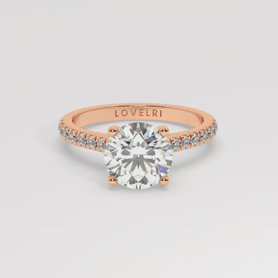 Rose Gold Round Cut Engagement Ring with a Pavé Band and a Hidden Stone - 360 View