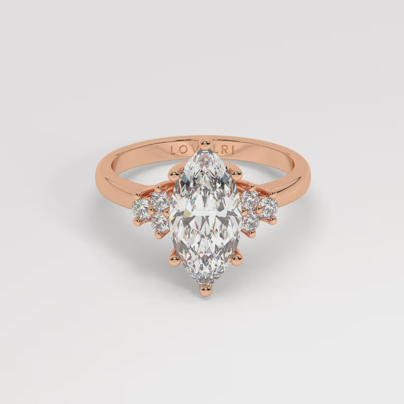 Rose Gold Marquis Cut Engagement Ring Accompanied by Round Stones - 360 View
