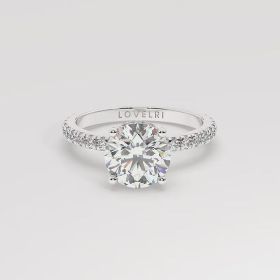 Platinum Round Cut Engagement Ring on a Pavé Band with a Hidden Halo - 360 View